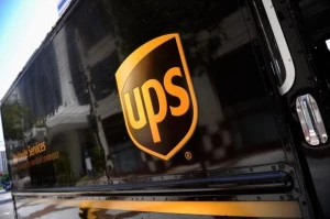 UPS's Income Rises 90 Percent